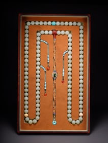 HETIAN JADE CARVED STRING NECKLACE