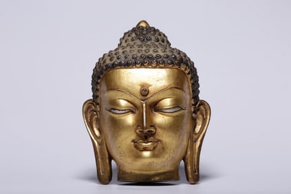 Gilded copper and silver inlaid Sakyamuni Buddha head