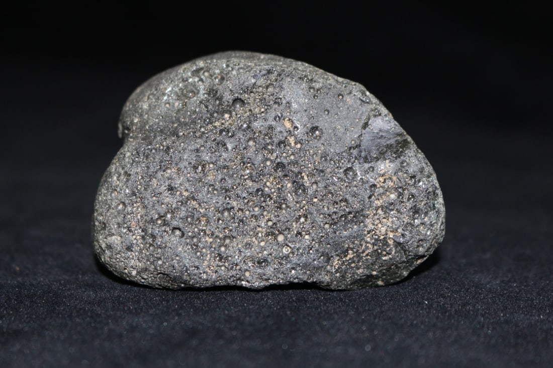 Spherical micro-glass meteorite