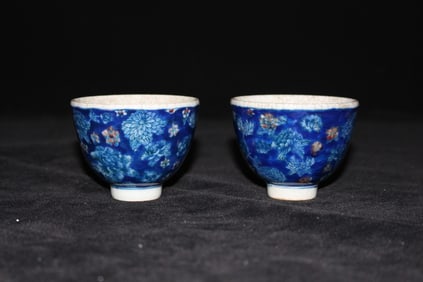 A pair of Kangxi-era cups with plum blossom patterns
