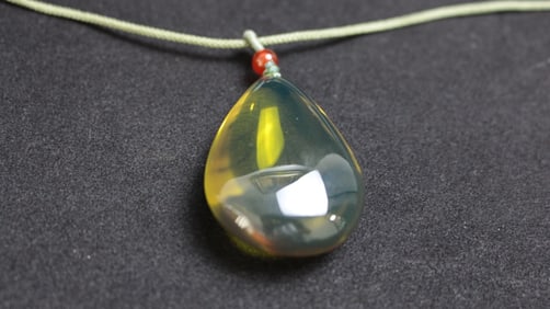 Blue amber water drop pendant