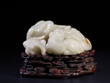 Hetian jade lion playing with ball ornament
