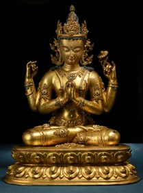 Gilded copper four-armed seated Guanyin