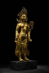Gilded bronze statue of Avalokitesvara holding a lotus hand