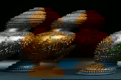 A pair of gilded bronze jars with Zhibaza patterns