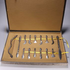 A SET IRON CAST PENDANT