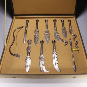 A SET IRON CAST PENDANT