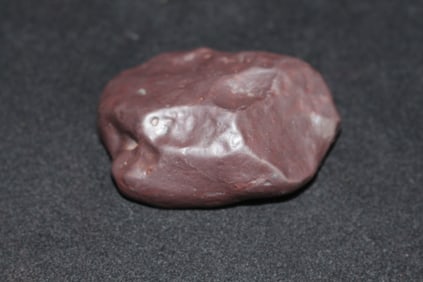 A NATURAL METEORITE SPECIMEN OF EXTRATERRESTRIAL ORIGIN