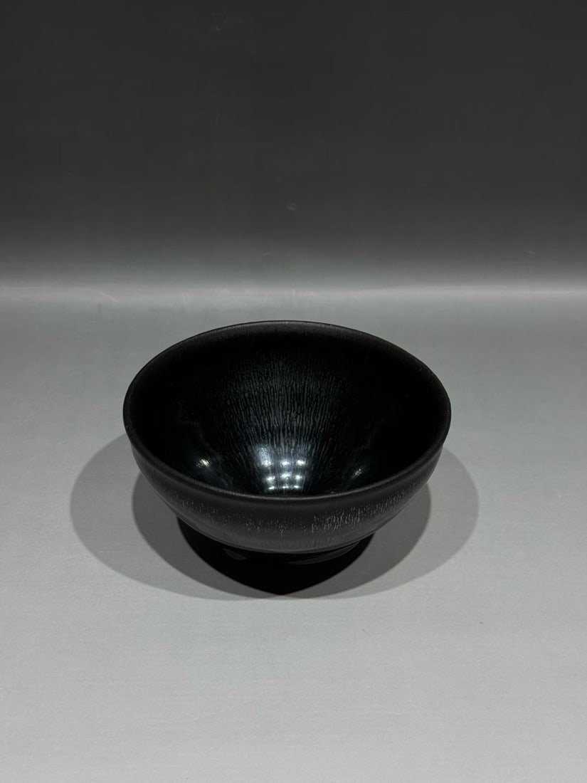 Song 12th C Jian Black-Glazed Silver Hare’s Fur Bowl: Song Dynasty (960–1279), 12th century, A Jian ware black-glazed tea bowl with hare’s fur streaks./ Mouth Diameter 12.5 cm / Height 7 cm/AI Authentication: Attributed to Jian ware, considered authe