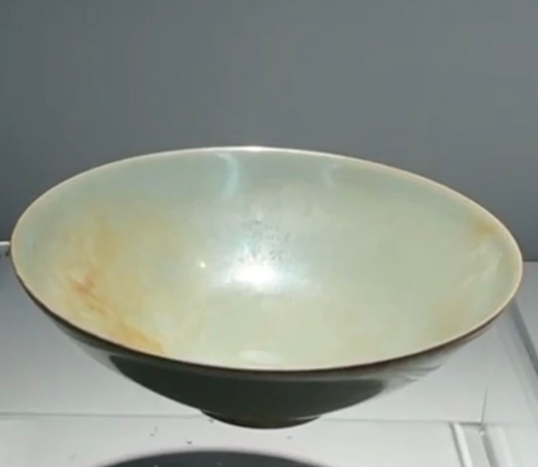 Song/Jin (12th C) Zhanggongxiang Ru-Type Celadon Bowl: A sky-blue glazed bowl, Zhanggongxiang Ru kiln, Song/Jin dynasty (12th century), finely potted with relatively thin walls and covered in a soft sky-blue glaze. The glaze surface exhibits natural linea