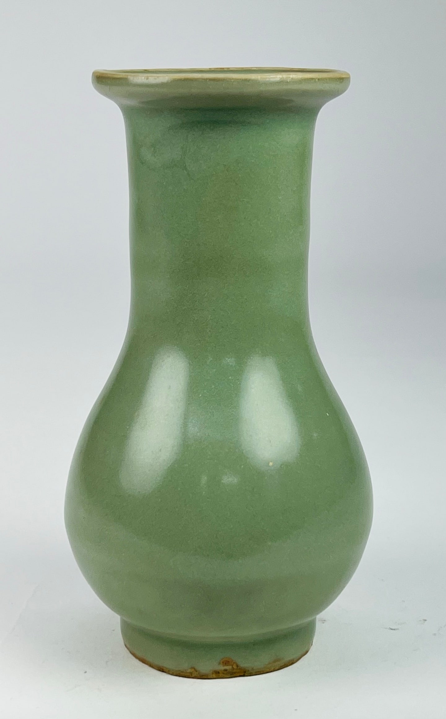 S Song 13th C Longquan Celadon Long-Neck Vase: Southern Song 13th C Longquan Celadon Long-Neck Vase.The vase is of well-proportioned and elegant form, dating to the Southern Song period, with a slender neck and balanced body. It is covered in a th