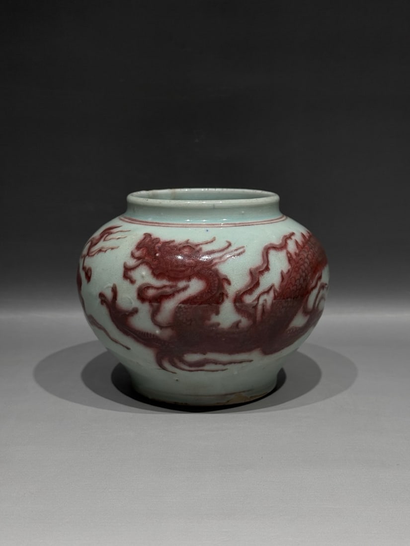 Yuan 13th C Underglaze Red Dragon Jar: Yuan Dynasty (1271–1368), 13th century, An underglaze-red jar with dragon motif, with a glaze crack to the rim./ Height 13 cm / Belly Diameter 15 cm