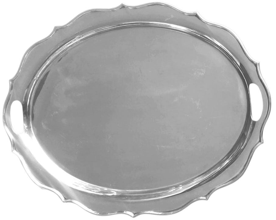 Oval Silver Serving Tray with Scalloped Rim and Handles: OVAL SILVER SERVING TRAY WITH SCALLOPED RIM AND HANDLES Description: This oval serving tray features a clean and understated design with a gently raised central field framed by a softly scalloped