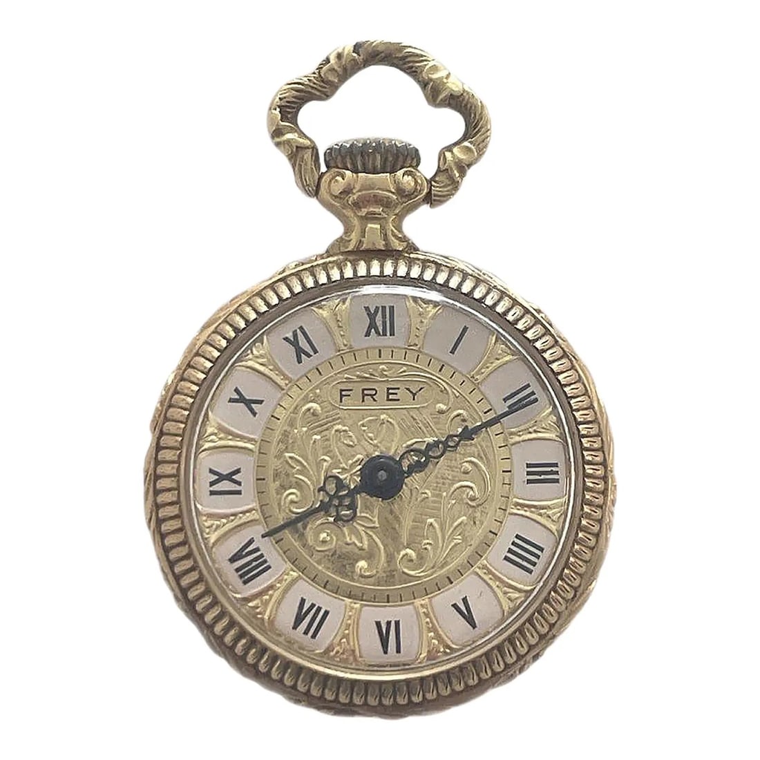 Frey Ornate Gold-Tone Open-Face Pendant Watch with Engraved Case: FREY ORNATE GOLD-TONE OPEN-FACE PENDANT WATCH WITH ENGRAVED CASE Description: This pendant watch features a richly ornamented design with strong decorative emphasis. The dial is composed of a central