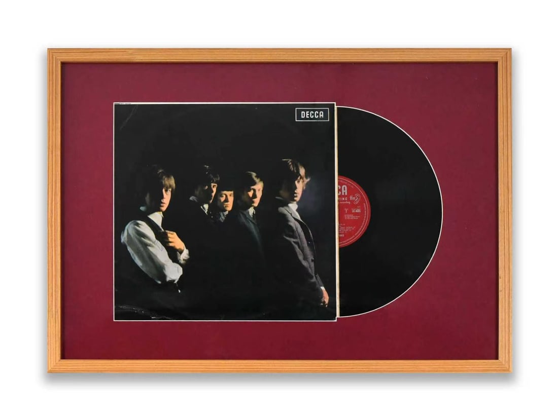 THE ROLLING STONES - Signed The Rolling Stones (Decca Records) LP Display: THE ROLLING STONES - SIGNED THE ROLLING STONES (DECCA RECORDS) LP DISPLAY Provenance and Authenticity: This framed LP display features an early Decca Records release by The Rolling Stones, signed by