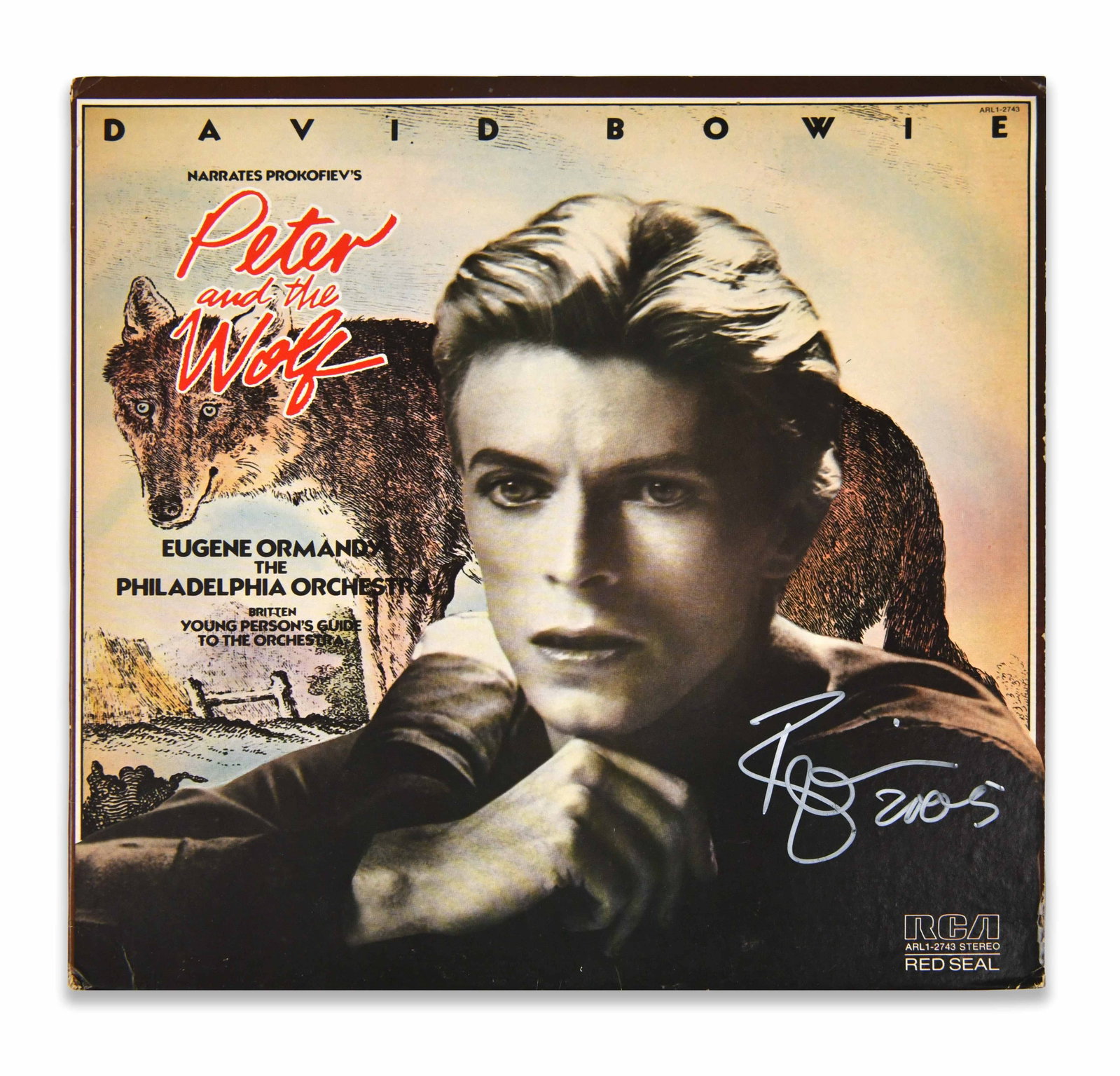 DAVID BOWIE - Signed Peter and the Wolf (RCA Red Seal, 1978) LP Display: DAVID BOWIE - SIGNED PETER AND THE WOLF (RCA RED SEAL, 1978) LP DISPLAY Dimensions: Vinyl records Size 12 1/4 x 12 1/6 in Provenance and Authenticity: The album is signed by David Bowie in silver