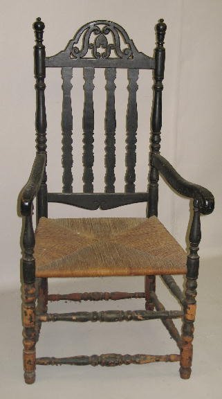 BANISTER BACK ARMCHAIR. Old black paint over earli