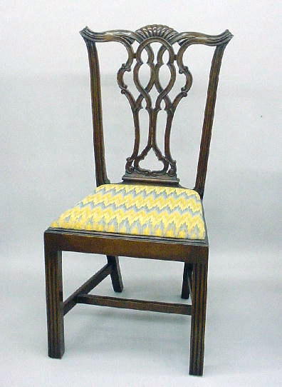 FOUR CHIPPENDALE STYLE SIDE CHAIRS. Mahogany with