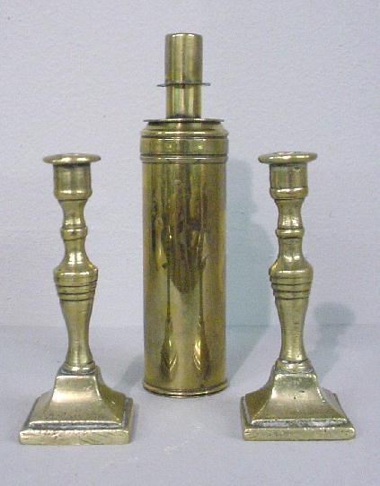 THREE BRASS LIGHTING DEVICES. Pictured are a pair