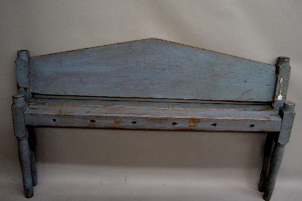 EARLY ROPE BED IN DESIRABLE ROBIN'S EGG B: EARLY ROPE BED IN DESIRABLE ROBIN'S EGG BLUE PAINT. High turned legs are tapered and flared with round disc finials on top. Peaked headboard. 52 3/4"w. 33"h. Rails have repaint and measure 70"l.