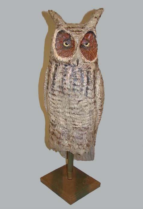 OWL CARVING BY FRANK FINNEY: OWL CARVING BY FRANK FINNEY. Great Horned Owl, slightly larger than life size, carved from tupalo wood with realistic paint and inset glass eyes. Mounted on a base with the artist's carved initial sig