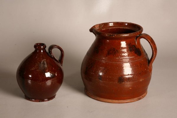 TWO PIECES OF REDWARE. American, 19th Century. Bot