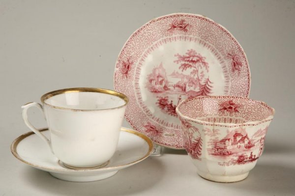 TWO CUPS AND SAUCERS.