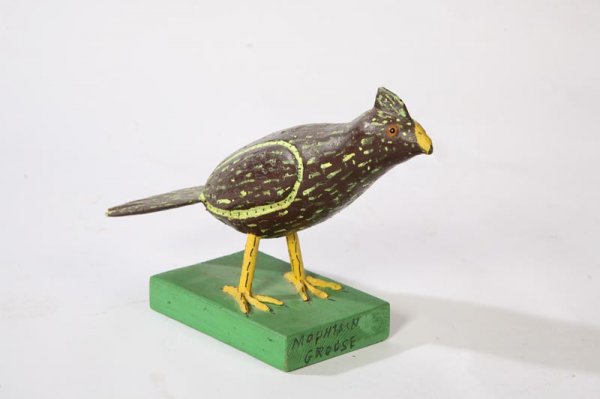 TWO FOLK ART CARVINGS BY CANFIELD. - 2