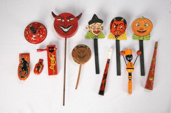 TWELVE HALLOWEEN NOISE MAKERS. Five tin lithograp