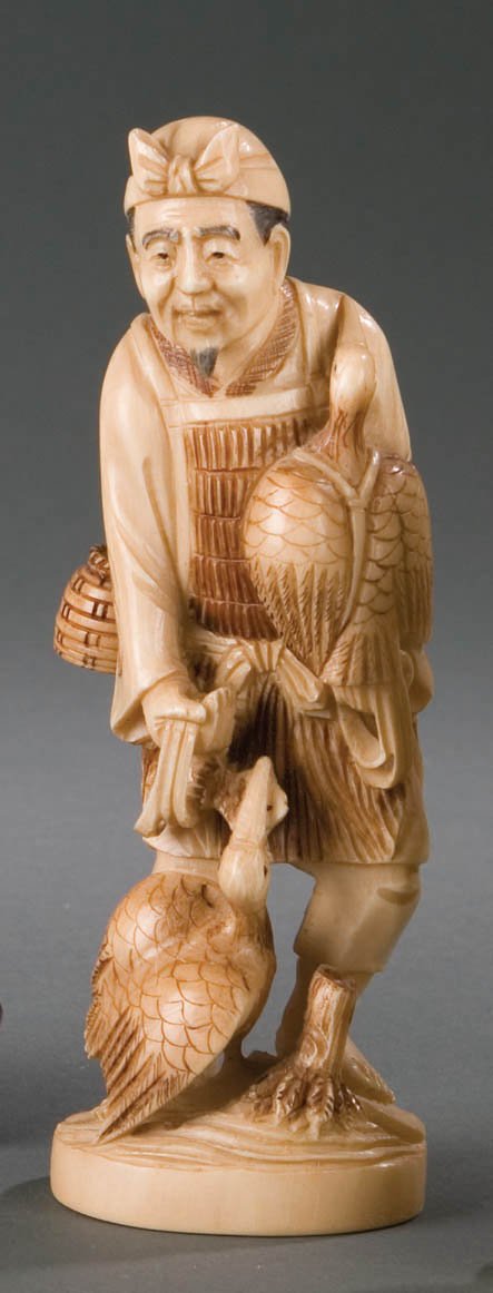 IVORY FIGURE OF FISHERMAN.