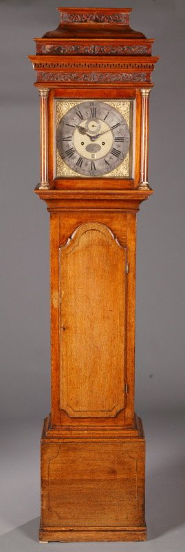 GEORGE II LONGCASE CLOCK.: GEORGE II LONGCASE CLOCK. English, Mid-18th Century, oak and mahogany. Sarcophagus top, inlaid case, and resting on a molded base. Brass movement is signed "Jn. Davis Windsor", probably John Davis II