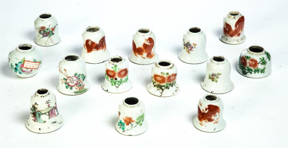 APPROXIMATELY FORTY PORCELAIN INKWELLS.: APPROXIMATELY FORTY PORCELAIN INKWELLS. China, late 19th century. Mostly bell shaped with foo dogs and floral decoration.