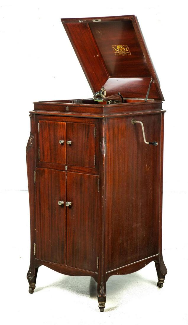 VICTOR VICTROLA UPRIGHT VV-XIV PHONOGRAPH RECORD: VICTOR VICTROLA UPRIGHT VV-XIV PHONOGRAPH RECORD PLAYER. American, 1st quarter-20th century. Mahogany cabinet with two door horn opening and two door record storage below. Three spring motor and nicke