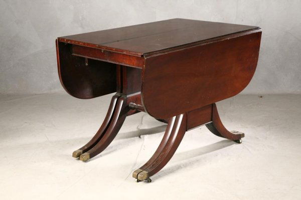 DUNCAN PHYFE STYLE TABLE. Mahogany with old worn: DUNCAN PHYFE STYLE TABLE. Mahogany with old worn finish. Drop leaf top with two leaves. Extends to 42"x 80". 29 ½"h.