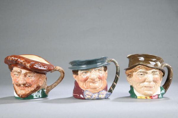 THREE ROYAL DOULTON TOBY JUGS. Paddy" 6" h. "Torr: THREE ROYAL DOULTON TOBY JUGS. "Paddy" 6" h. "Torry Heller" 5 3/4" h. "Drake" 5 1/2. All are marked.