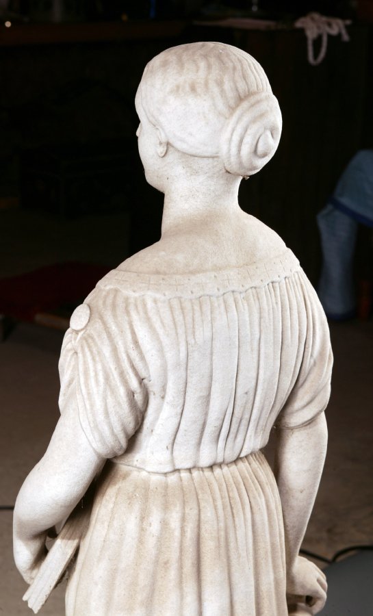 STONE SCULPTURE OF A YOUNG WOMAN (AMERICAN, MID - 7