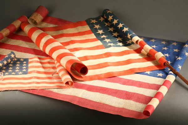 THREE PRINTED U.S. PARADE FLAGS. American, 18
