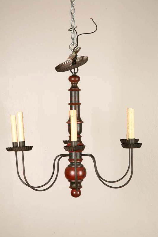 SIX ARM CHANDELIER. David T. Smith, Ohio, 20t: SIX ARM CHANDELIER. David T. Smith, Ohio, 20th century. Turned wooden center with distressed red and green paint and six iron arms with crimped tin candle holders. Electrified. 25"d. 22"h.