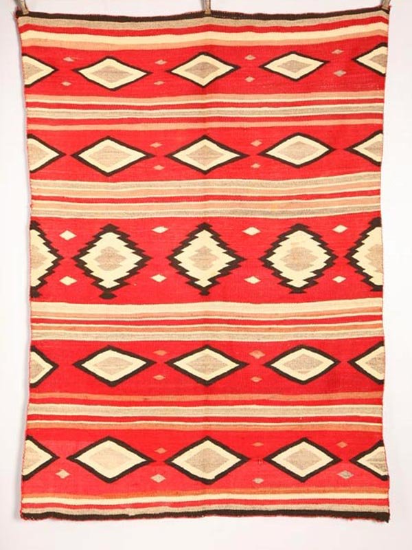 NAVAJO WEAVING. With bands and rows of diamon