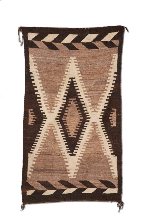 NAVAJO WEAVING. In a geometric pattern. Minor