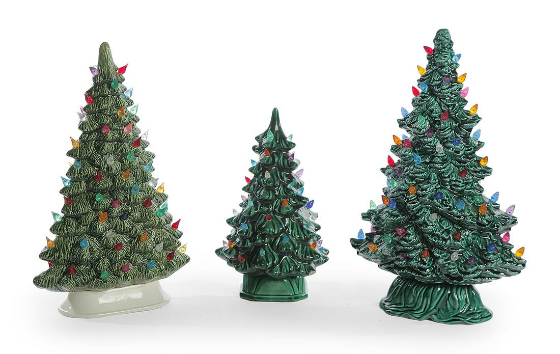 THREE CERAMIC CHRISTMAS TREES.: Late 20th century. Bases and trees with electric lights. Some lights missing. 11.25” to 15.5”h.