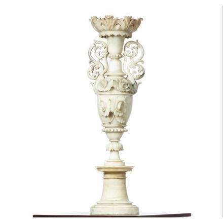 DECORATIVE ALABASTER URN.: Probably Italian, early 20th century. Multiple pieces with threaded bolt. Acanthus leaf rim and handles and relief carved roses. Imperfections. 30”h.