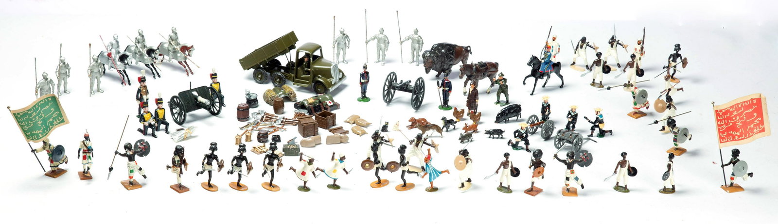 EIGHT BOXES OF LEAD SOLDIERS.: 20th century. Britain "Army Lorry No. 1335." Royal Field Artillery "No. 8 Set" marked "82." "MF 45 Royal Horse Artillery Action Crew," "Naval Landing Party Gun and Lumber Crew," "Miscellaneous Mule Pa