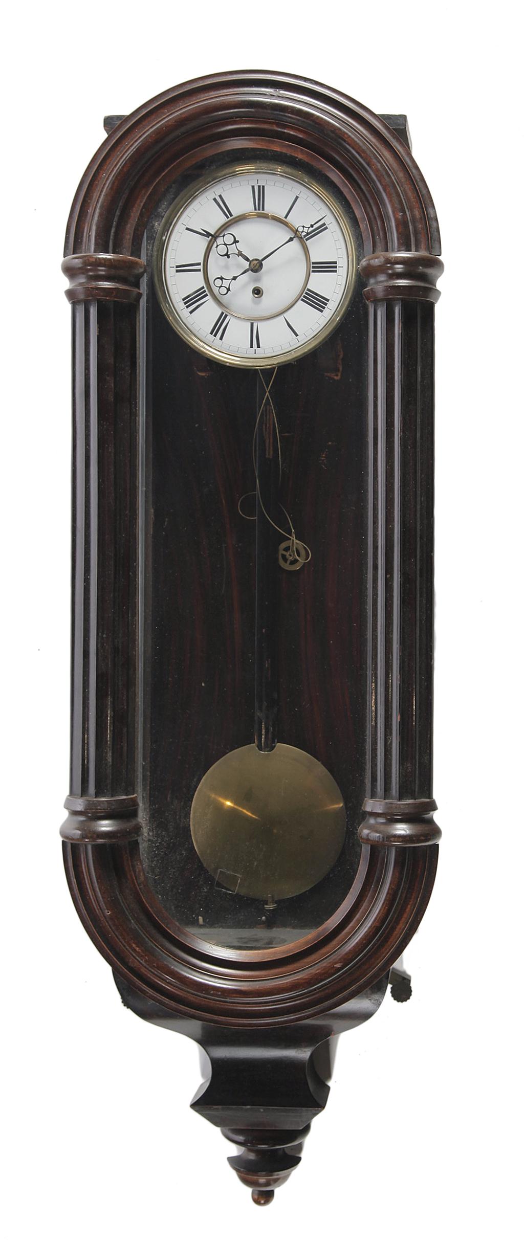 SINGLE WEIGHT "REGULATOR" STYLE WALL CLOCK.: European. 4th quarter-19th century. Lozenge shaped rosewood case with corbel base, porcelain face and brass works, weight and pendulum, 41"h. 13"w. 6"d.