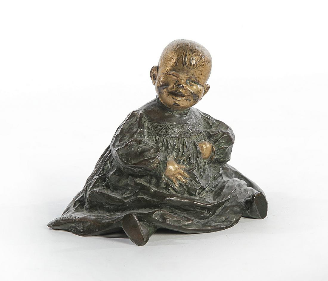 BRONZE CHILD BY HANS STOLTENBERG LERCHE (GERMANY,: Signed on the base. Seated with applied gold and verdigris surface. 5.5”h.