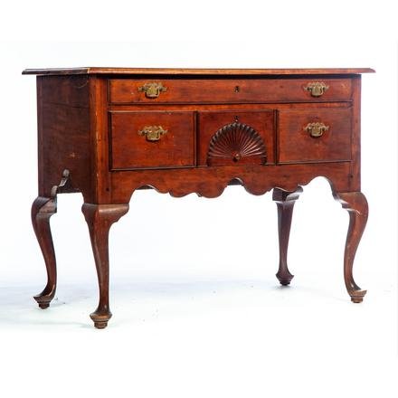 QUEEN ANNE DRESSING TABLE.: American. 2nd half-18th century. Cherry with pine and poplar secondary, top with routed edge, four dovetailed overlapping drawers, one over three with fan carving on center drawer, cabriole legs with 