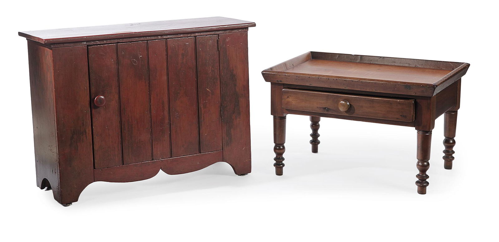 AMERICAN CUPBOARD AND COFFEE TABLE.: Late 19th century, pine. Coffee table made from Sheraton legs and tray. Dovetailed drawer. Refinished. 19.25”h. 32”W. 22.25”d. And a low cabinet with beadboard door and scalloped apr