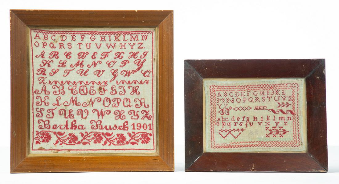 TWO FRAMED RED AND WHITE SAMPLERS.: Probably American, ca. 1901. Yarn on linen. Alphabet in three fonts and "Bertha Busch 1901 with floral border along bottom. 16.5" square. And one multicolored silk thread on linen with alphabets and g