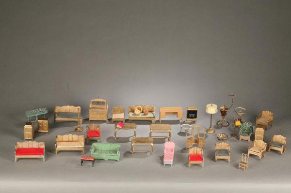 THIRTY ONE PIECES OF TOOTSIETOY DOLLHOUSE FURNITUR: THIRTY ONE PIECES OF TOOTSIETOY DOLLHOUSE FURNITURE. Nine chairs, five sofas, five tables, two floor radios, two victrolas, one desk with drawers, vanity, bureau, three lamps, bench and chaise. Paint