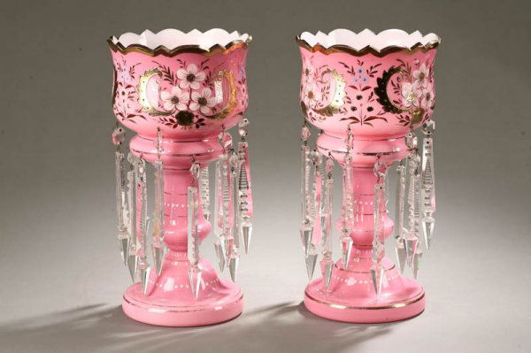 PAIR OF MANTLE LUSTERS. Both pink cased in white: PAIR OF MANTLE LUSTERS. Both pink cased in white with enamel flowers, gilt accents and sawtooth prisms. 12 7/8"h.